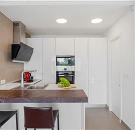 5 bedroom beachfront villa with heated pool near Omis, sleeps 9